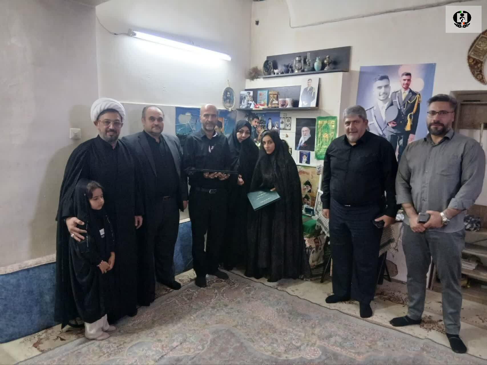 تجلیل از خانواده شهید مبارزه با مواد مخدر در قم